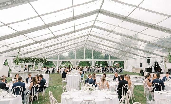 2371787903210559.jpg Wedding marquee interior with romantic drapes and warm lighting for evening banquet