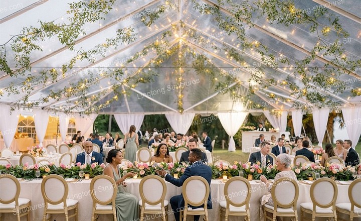 6571787903214786.jpg Spacious wedding marquee with clear PVC sidewalls for natural light and outdoor view
