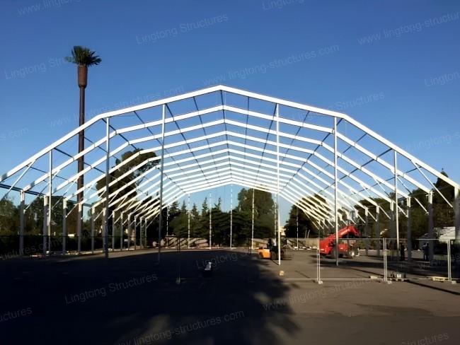 Sports tent exterior showing modular aluminum frame and large span for multi-court layouts