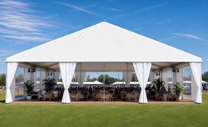 Marquee tent exhibition setup with booth displays and column-free interior