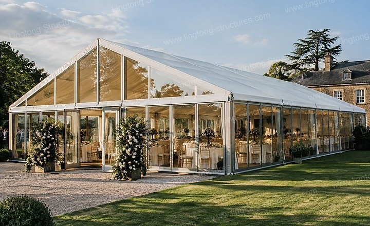 8171792484711883.jpg Large party wedding tent with glass walls for outdoor ceremony